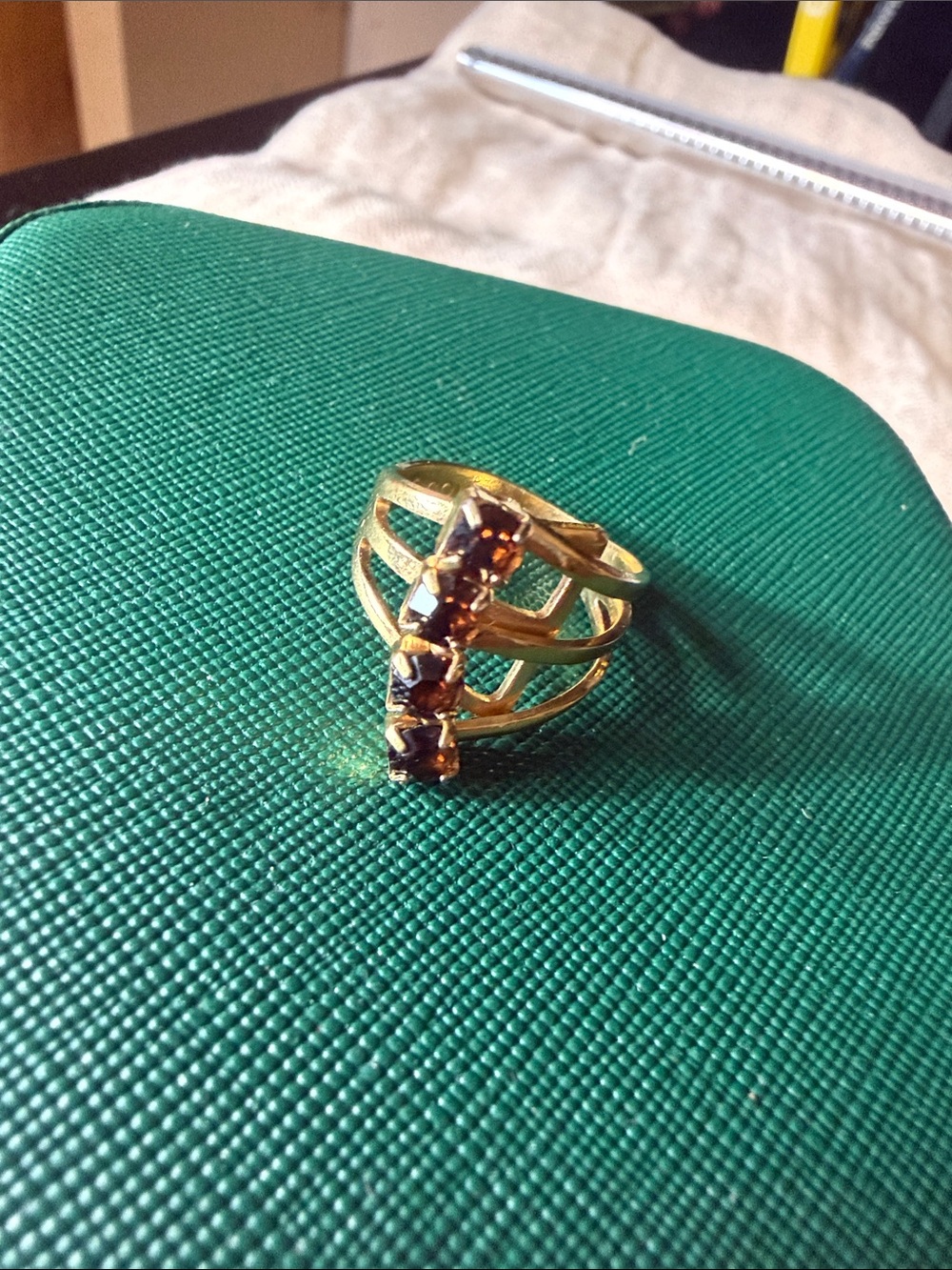 Vintage adjustable Sarah Coventry Gold Multi-Band Ring with Deep Red Stones